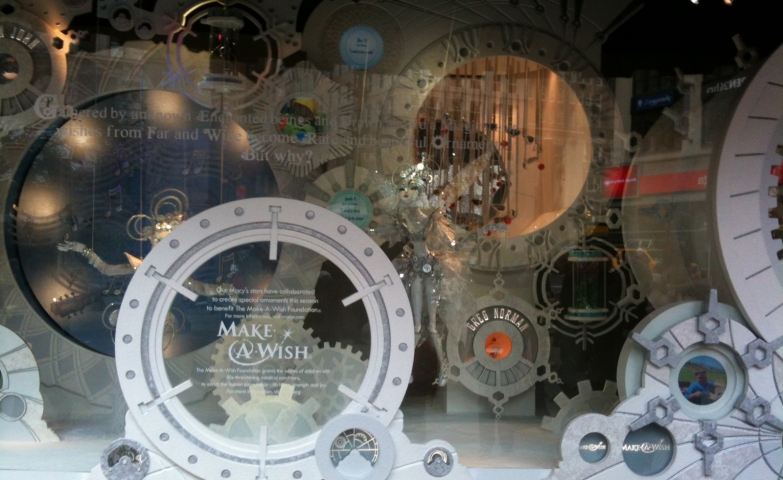 Using a white and clean color scheme, Macy’s has a spectacular "Make a Wish" mechanism for the Christmas window display.